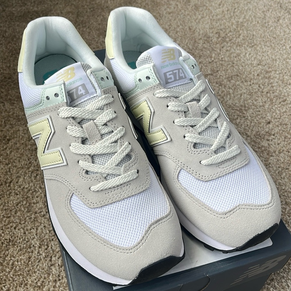 New Balance 574 in Nimbus Cloud + Summer Fog color. Only size 8.5 available.